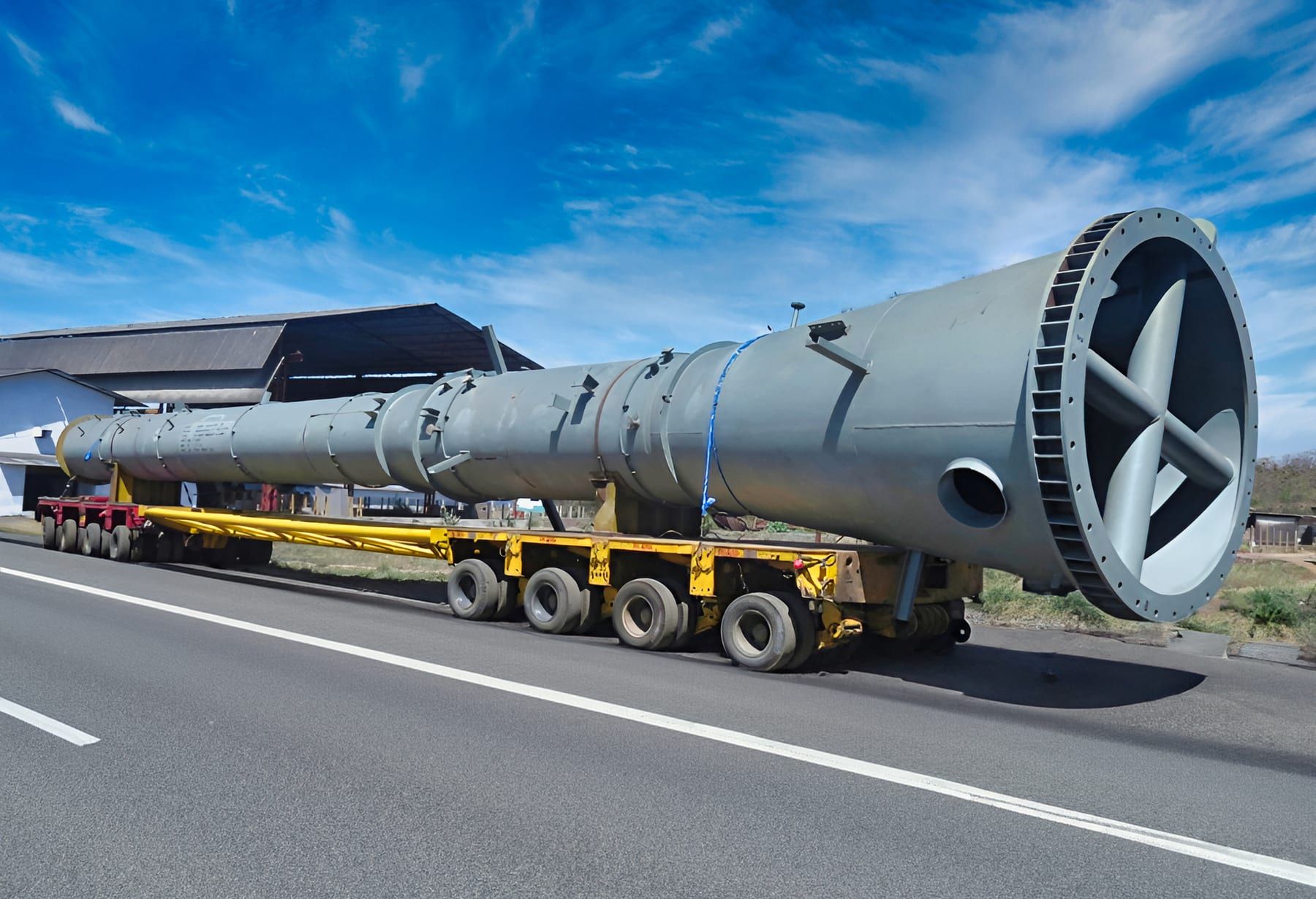 Tall column shipped horizontally on a multi-axle trailer
