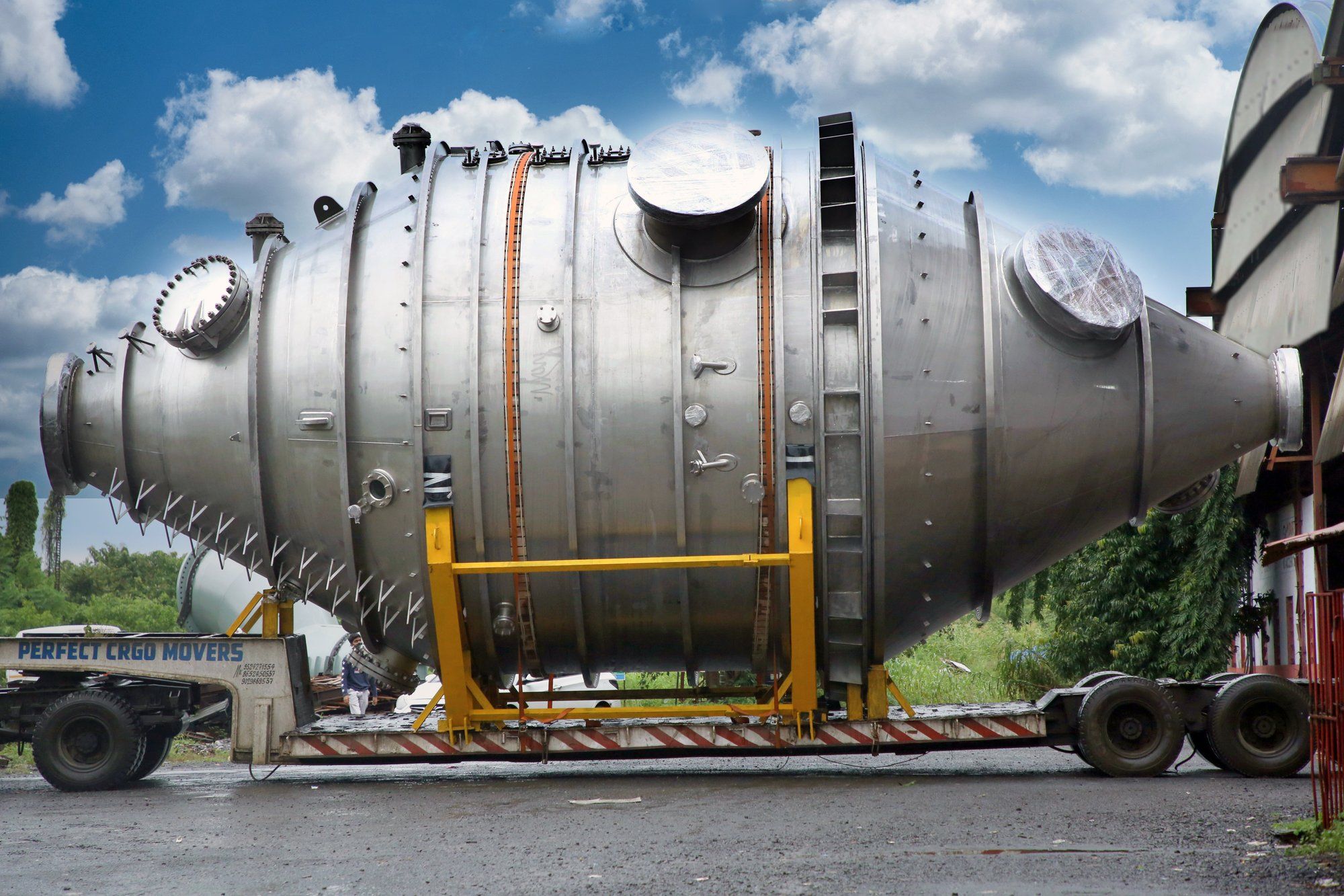 Stainless steel evaporator vessel loaded on a trailer for shipment