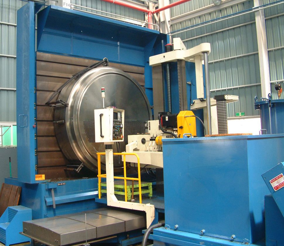 Gun drilling machine with a large tubesheet